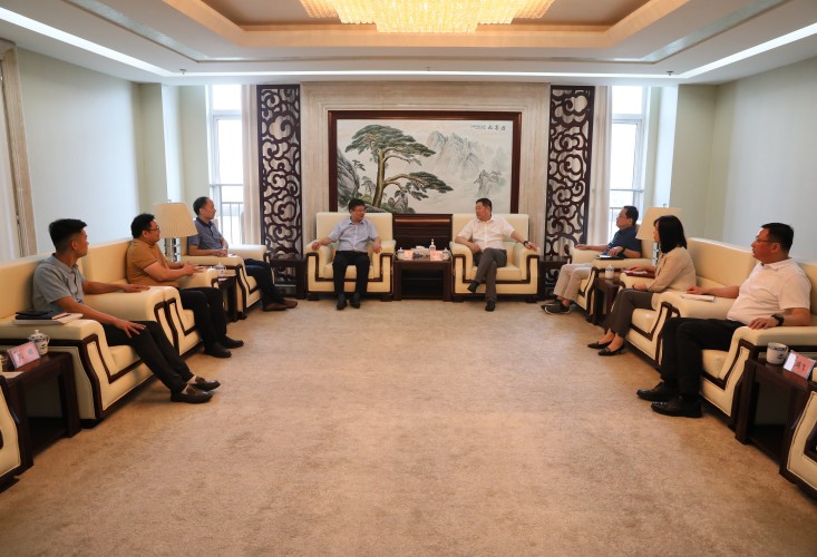Wang Tao led a team to visit China coal mine construction group